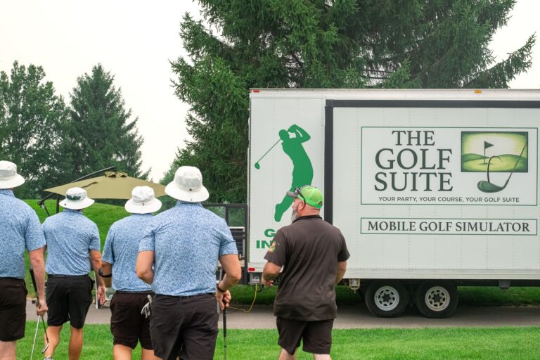 Golfers visiting The Golf Suite mobile golf simulator