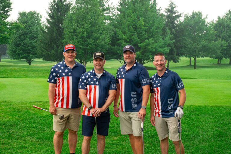 Foursome in matching stars-and-stripes shirts